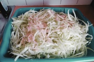 2 tablespoons of non-iodized salt is sprinkled over the cabbage.