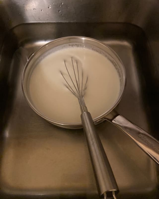 After the milk has been heated it is cooled down in the sink until it reaches 40C.