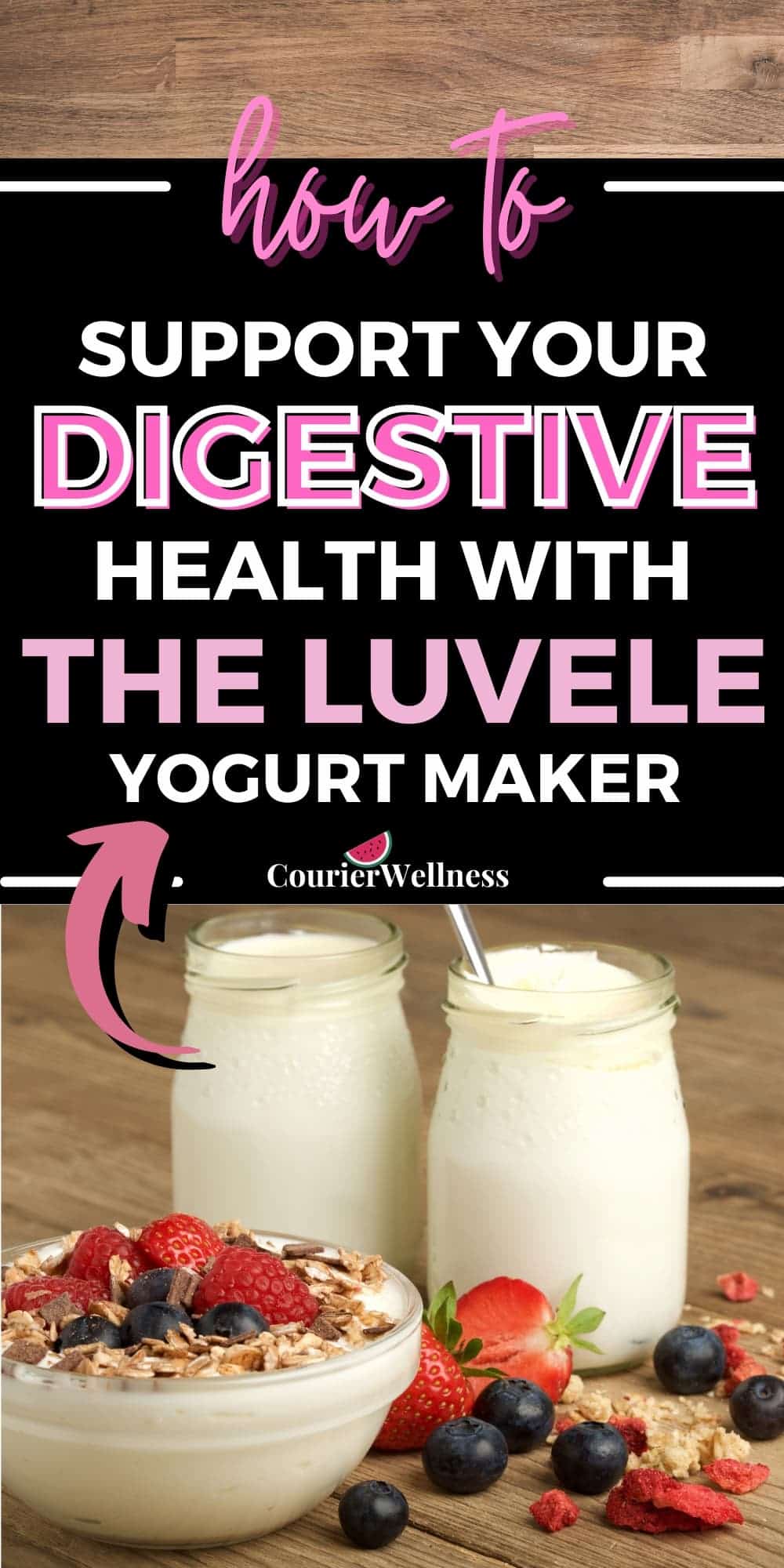 Three jars of home-made yogurt on a wooden table, with berries sprinkled on top of one jar and scattered on the table.
