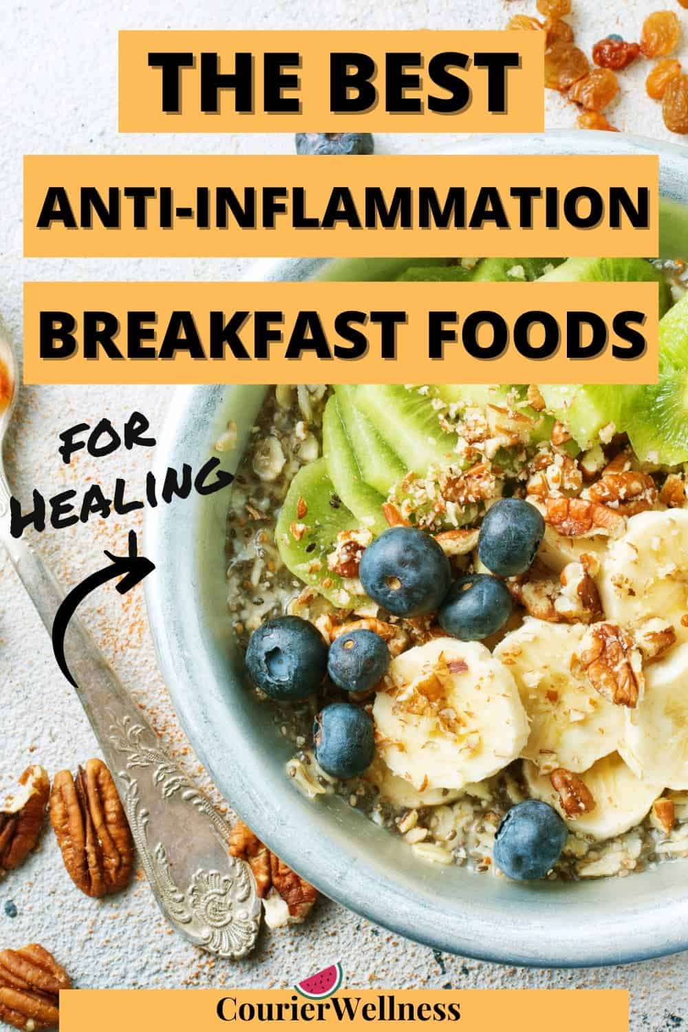 Oatmeal topped with kiwi, banana, and blueberries, served with nuts and golden raisins — a colorful anti inflammation breakfast to start the day gently.