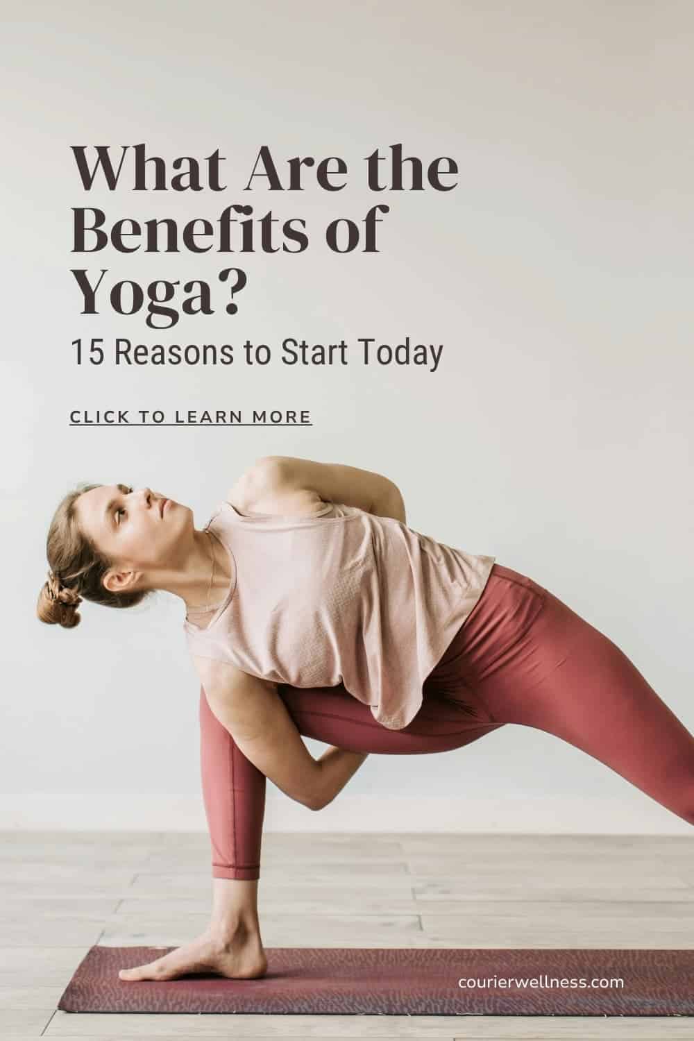 Woman in a twisted yoga pose with arms clasped behind her back and leg extended.