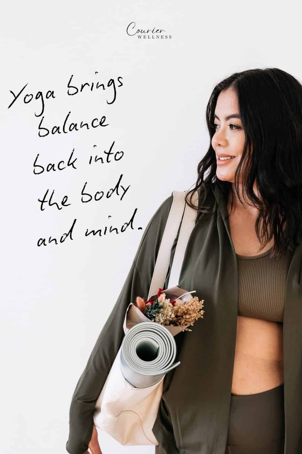 Woman holding a bouquet of flowers after a yoga class, smiling and relaxed.