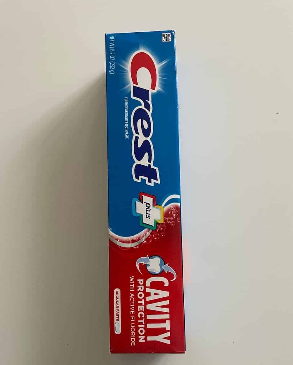 Crest Cavity Protection Toothpaste on a white background.